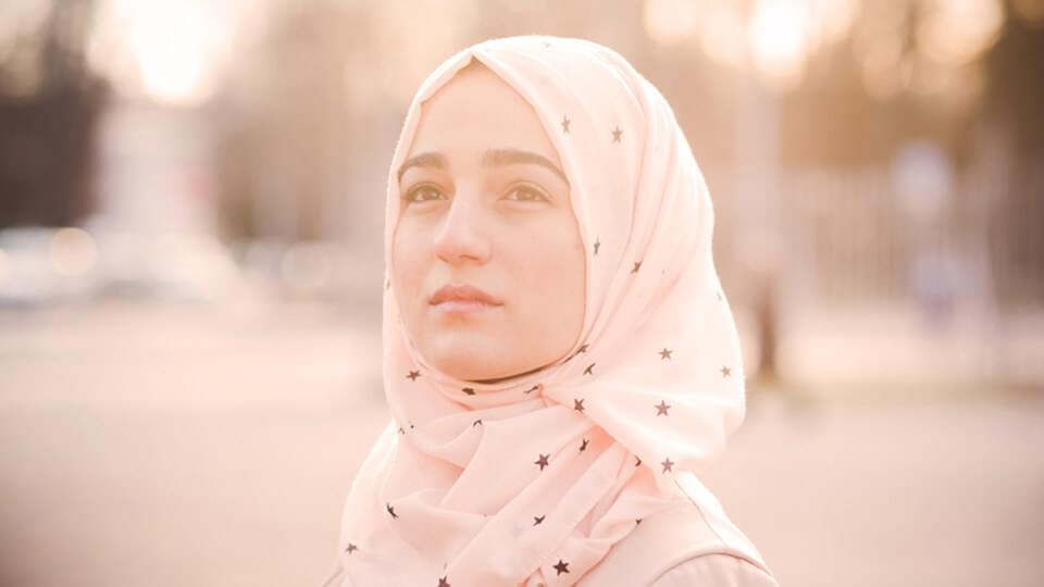 Woman in headscarf outside
